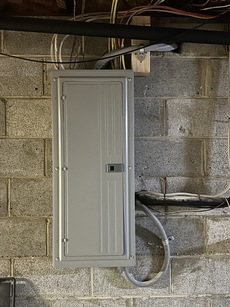 After — closed, finished electrical panel
